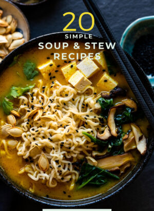 Spicy Pumpkin Ramen in a black bowl, one of 20 simple soup and stew recipes to stay cozy.