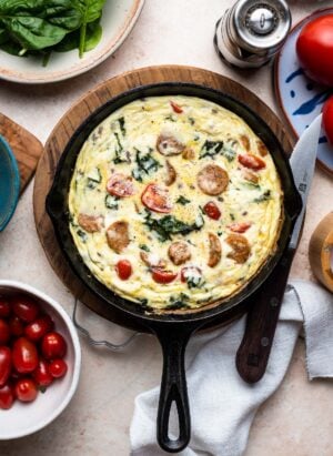 Italian Sausage and Kale Frittata in a cast iron skillet.