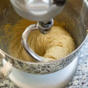 Mixing Sweet Potato Challah Bread dough in a stand mixer.