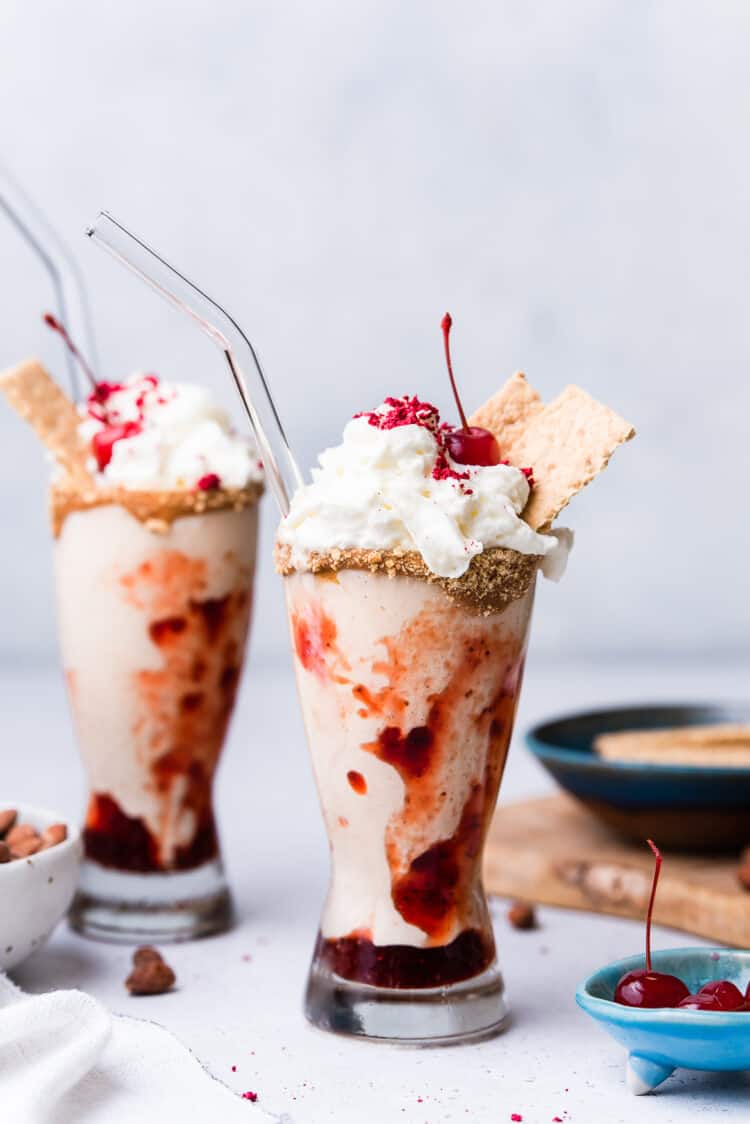 Almond Butter and Jelly Vegan Milkshakes in tall glasses.