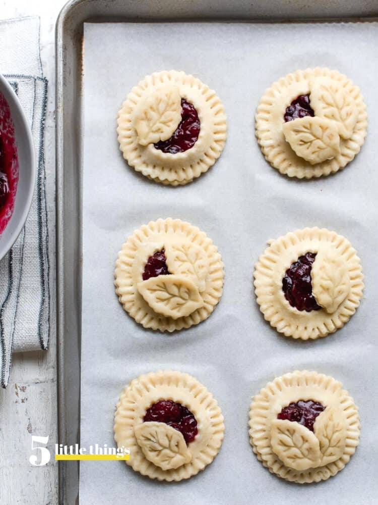 Cranberry hand pies formed on a baking sheet ready for the oven were one of Five Little Things I loved the week of December 4, 2020.