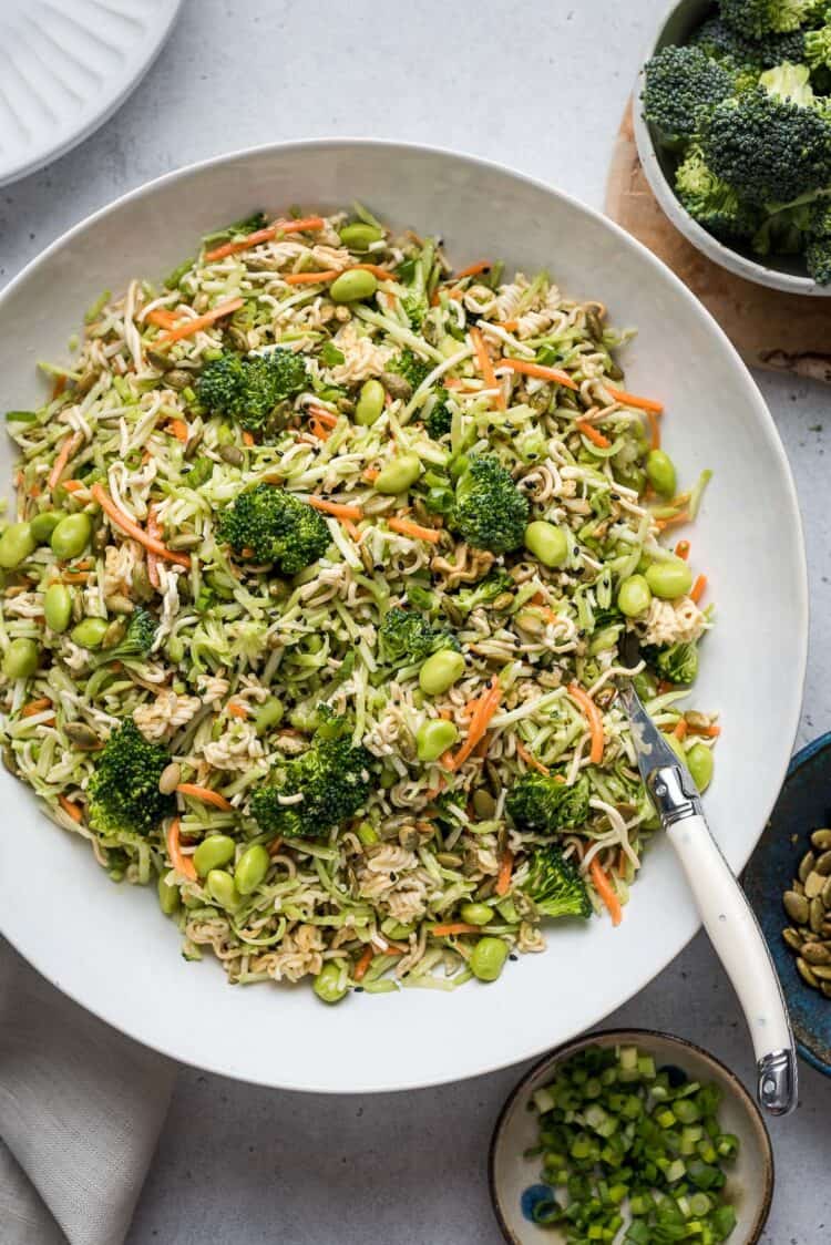 Broccoli Slaw with Ramen in a white bowl.