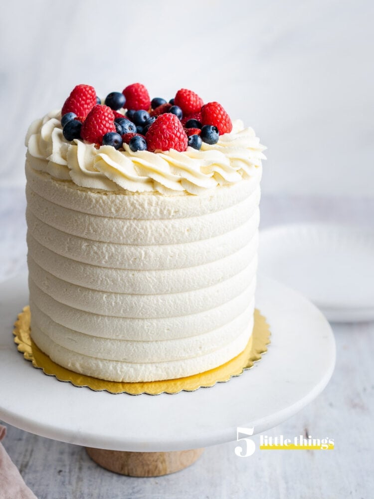 Birthday cake on a cake stand.