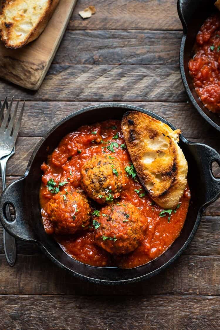 Mushroom meatballs and marinara sauce in a serving dish