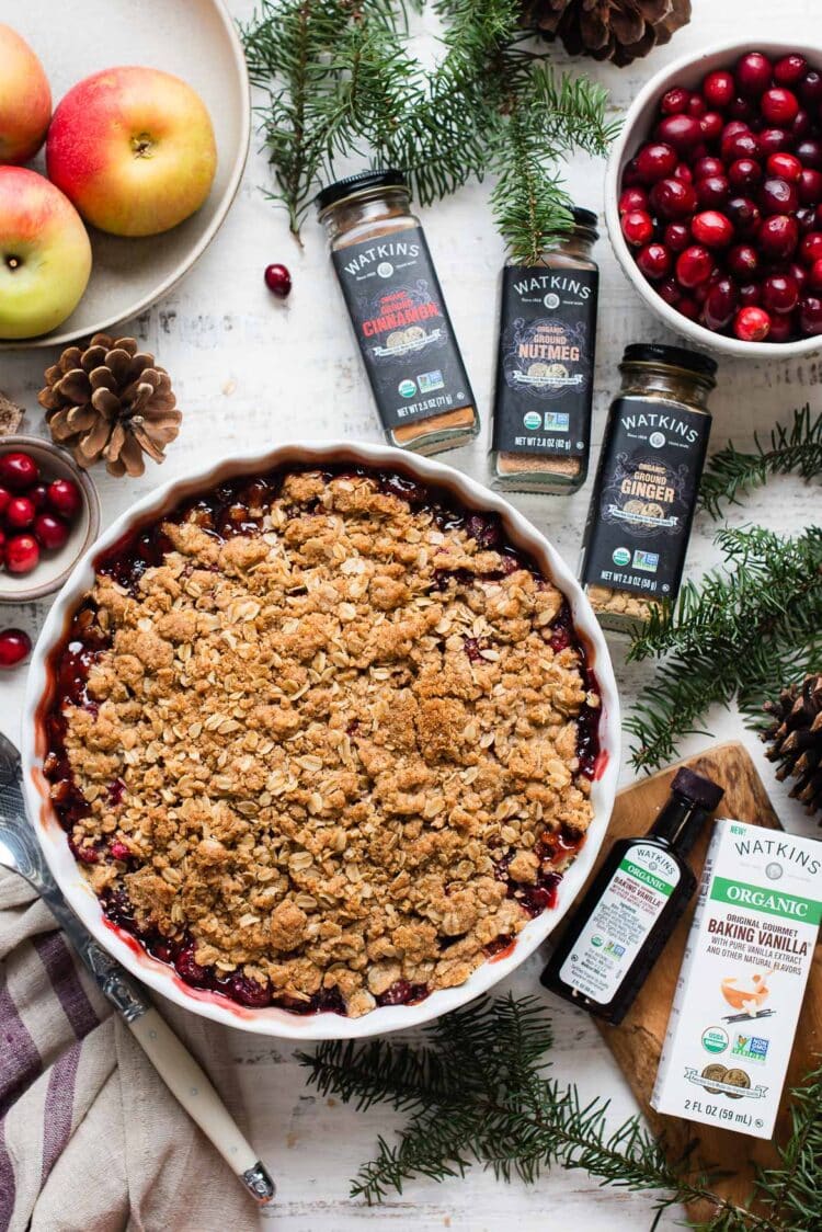 Cranberry Apple Crisp in a baking dish with The Watkins Company spices.