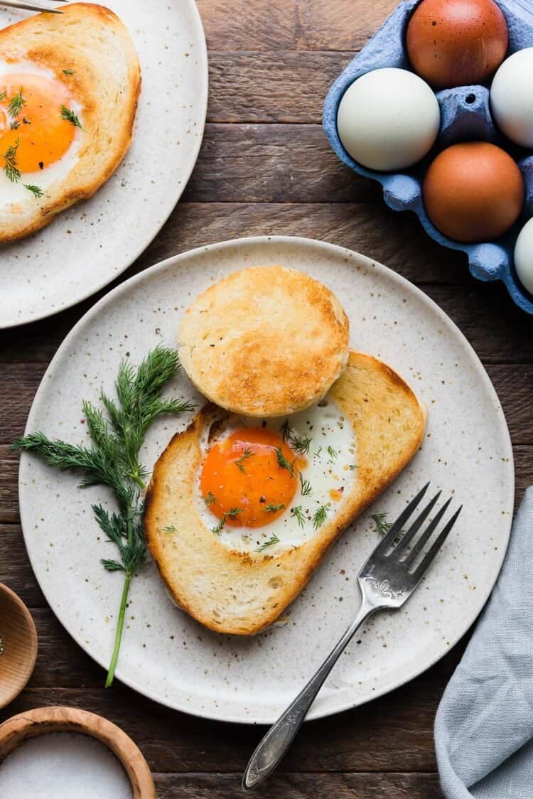 Eggs in a Nest on a plate garnished with dill.
