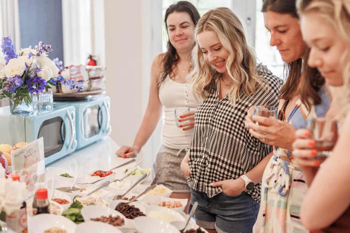 Looking at the toppings at the Minute Rice Snack Break at the Fresh Air Retreat in Scottsdale, AZ