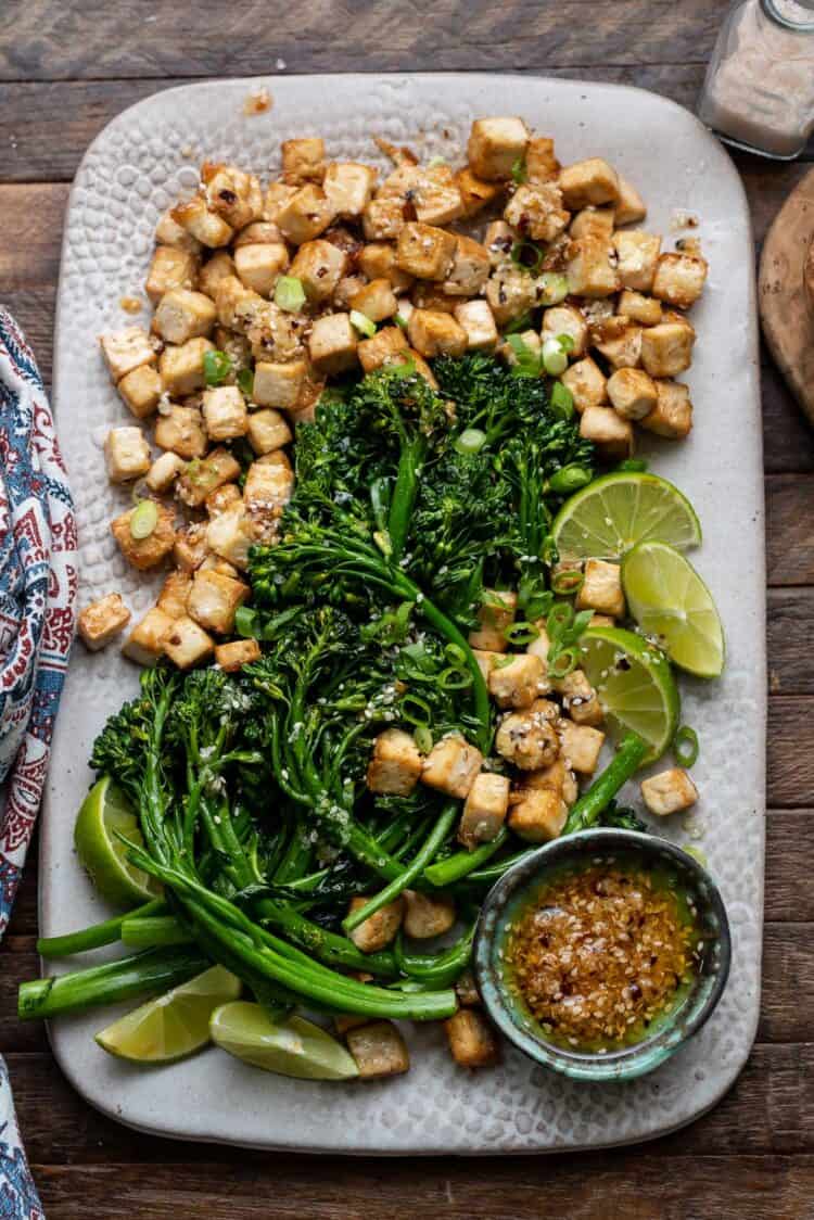 Firecracker Tofu With Broccolini and Chili Garlic Oil on a plate.