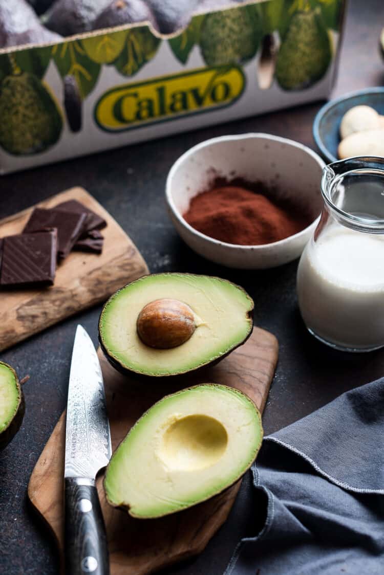 Avocados and ingredients for Avocado Chocolate Pudding.
