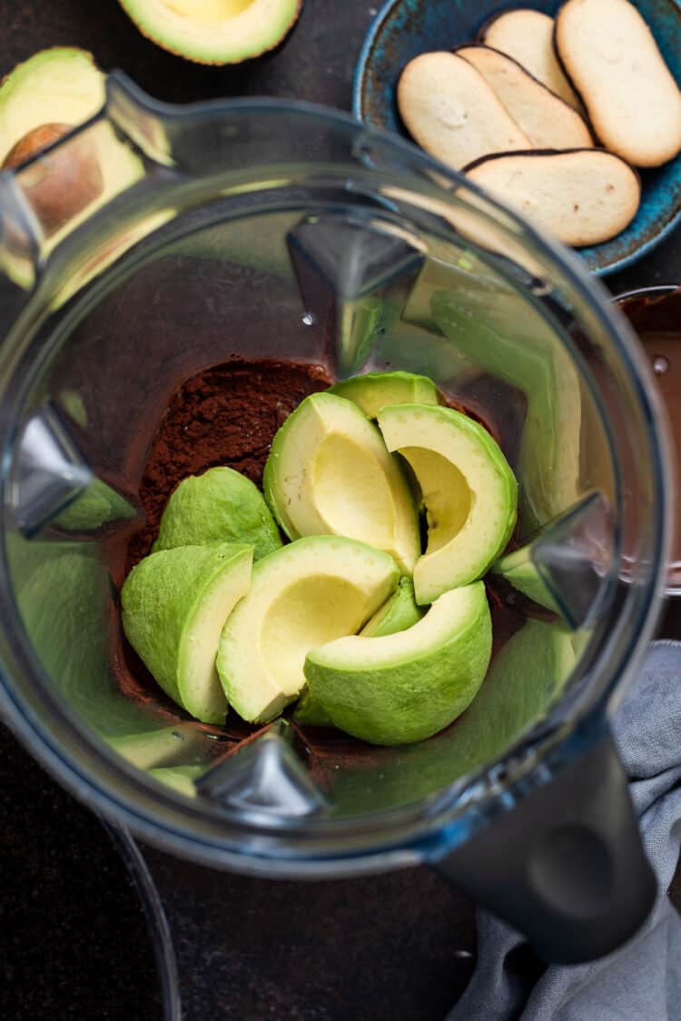 Avocado in a blender for avocado chocolate pudding.