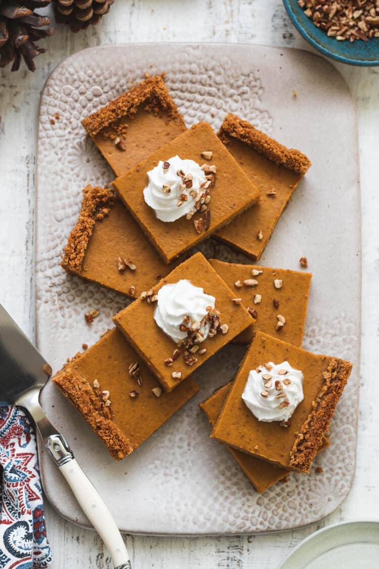 Pumpkin Pie Bars with Graham Cracker Crust on a serving tray.