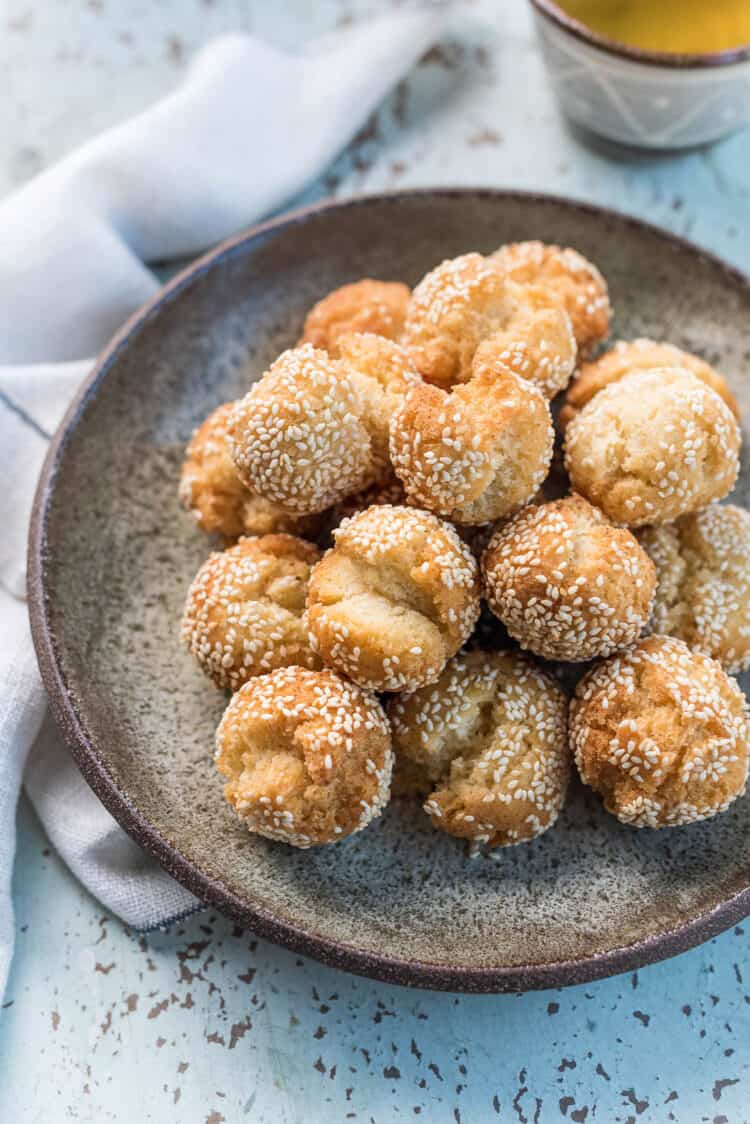 Laughing Doughnuts (Sesame Smiling Cookie Balls) in a bowl.