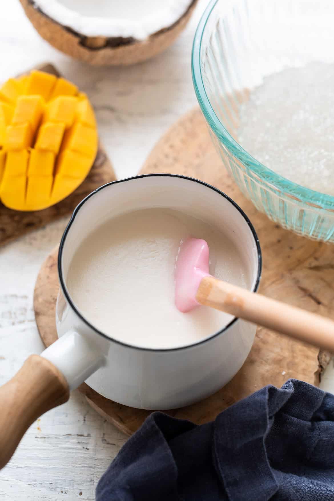 Making the coconut cream in a small pan for mango coconut tapioca pudding.