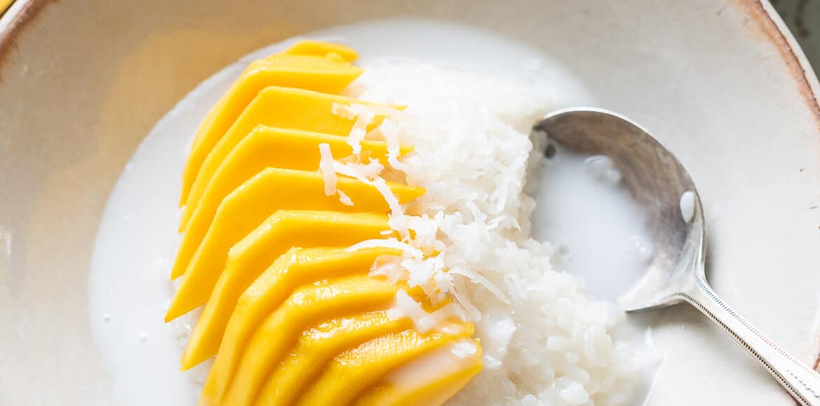Sweet Coconut Sticky Rice with Mango in a bowl.