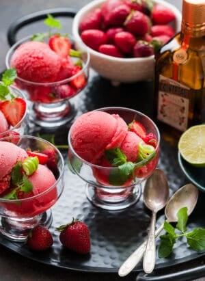 Strawberry Cointreau Sorbet in serving glasses on a tray.
