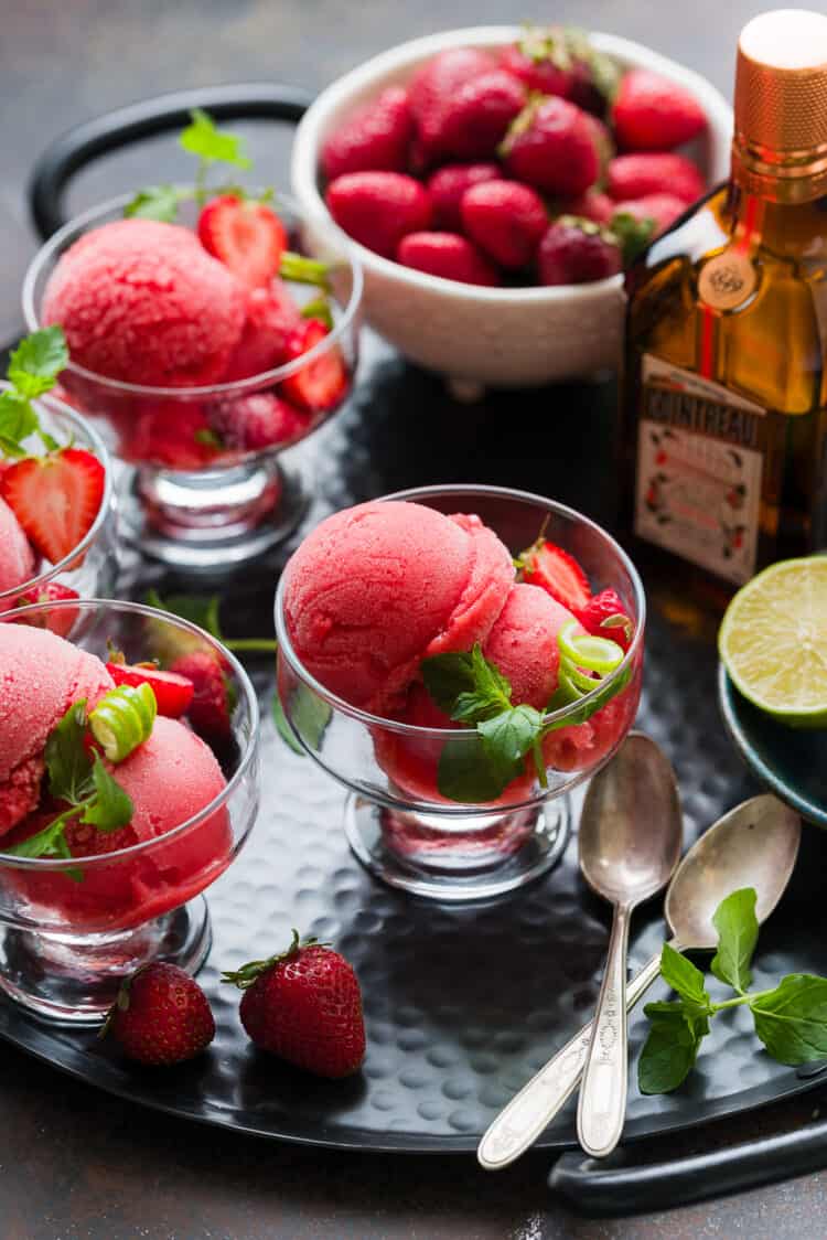 Strawberry Cointreau Sorbet in serving glasses on a tray.