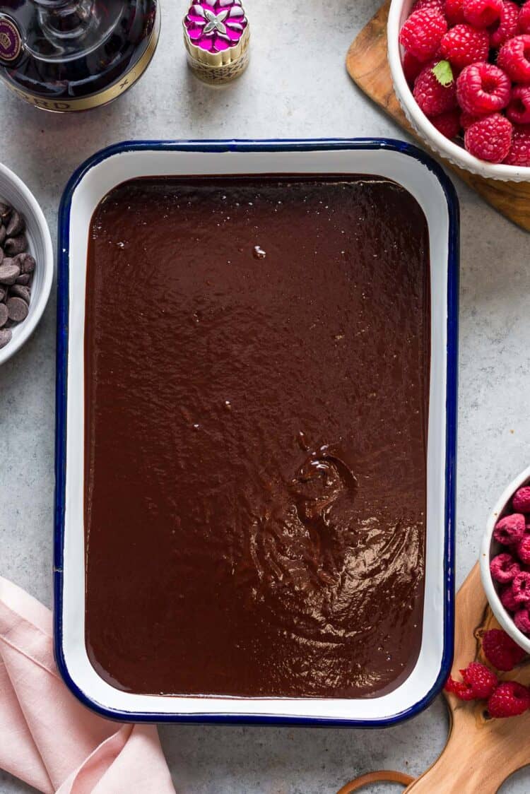 A tray of chocolate raspberry mixture for to chill for truffles.