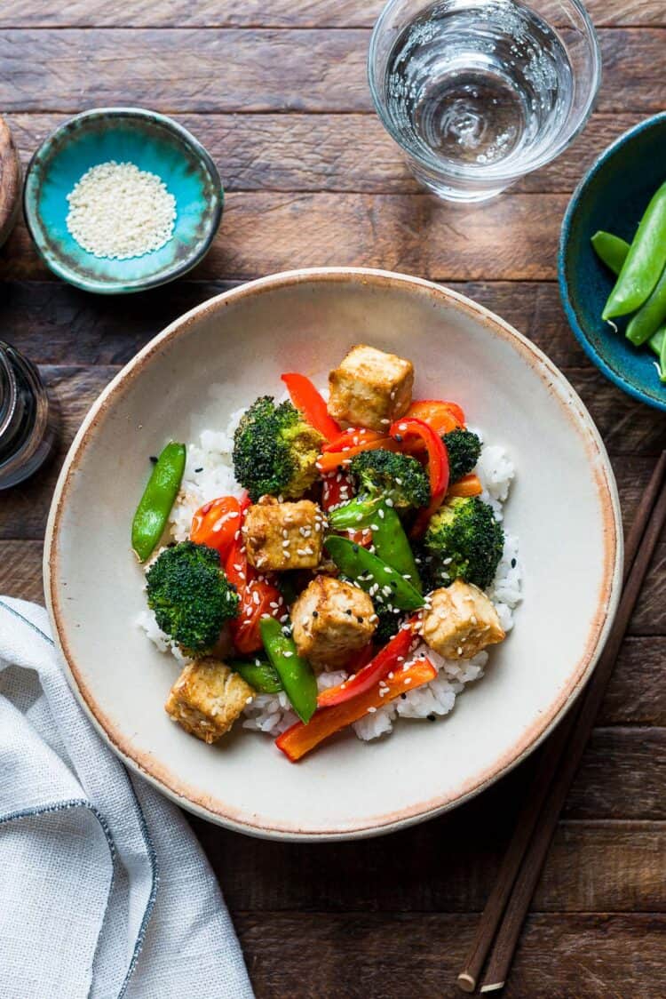 Air Fryer Sesame Garlic Tofu and Vegetables over rice.