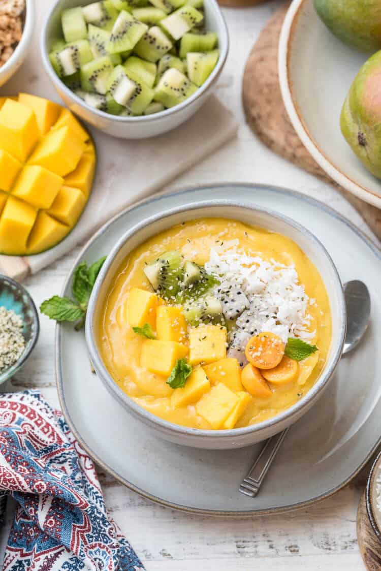 Tropical Mango Smoothie Bowl in a white bowl.