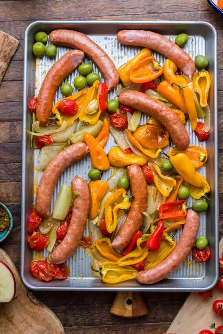 Raw sausages for sheet pan sausage with peppers, fennel, and olives.