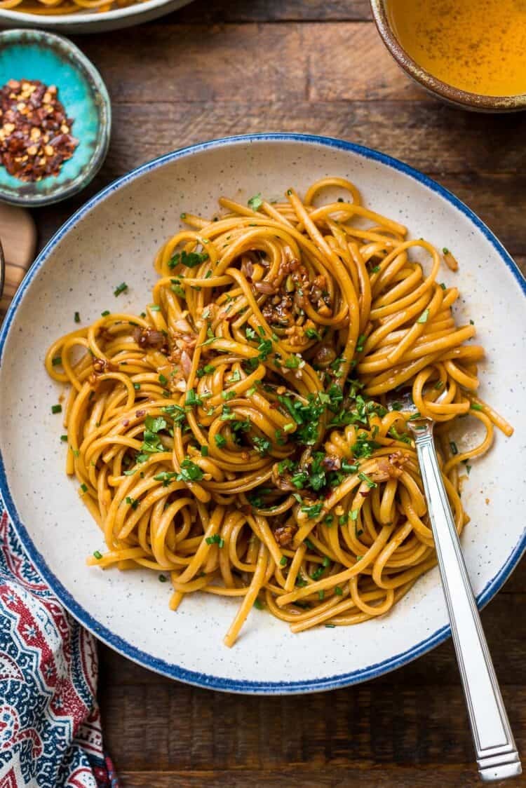 A bowl of miso-butter garlic noodles.