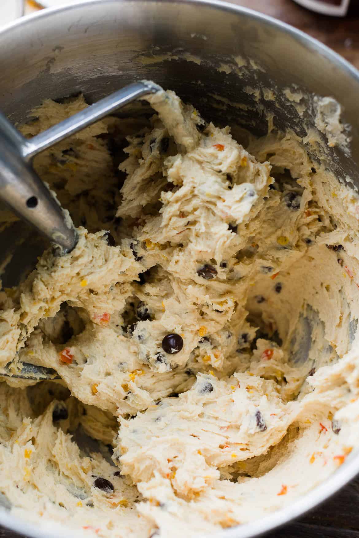 Mixing cookie batter in bowl of stand mixer.