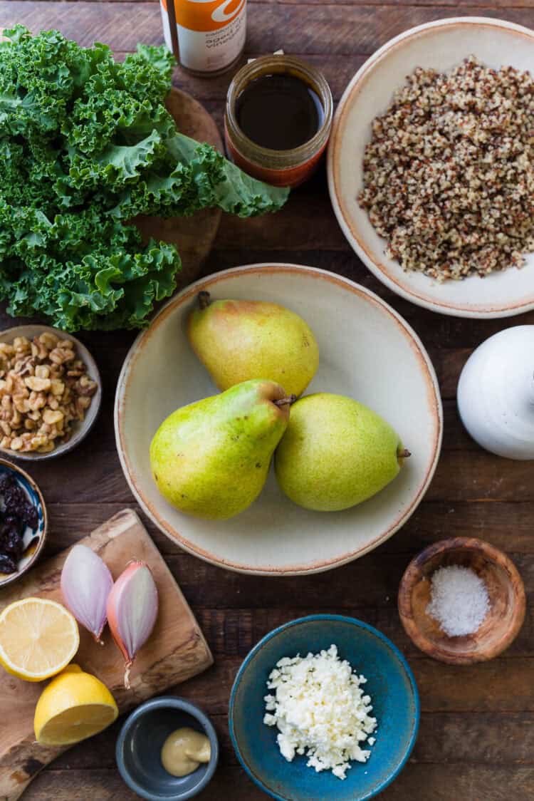 Ingredients for a kale and quinoa salad with pears.