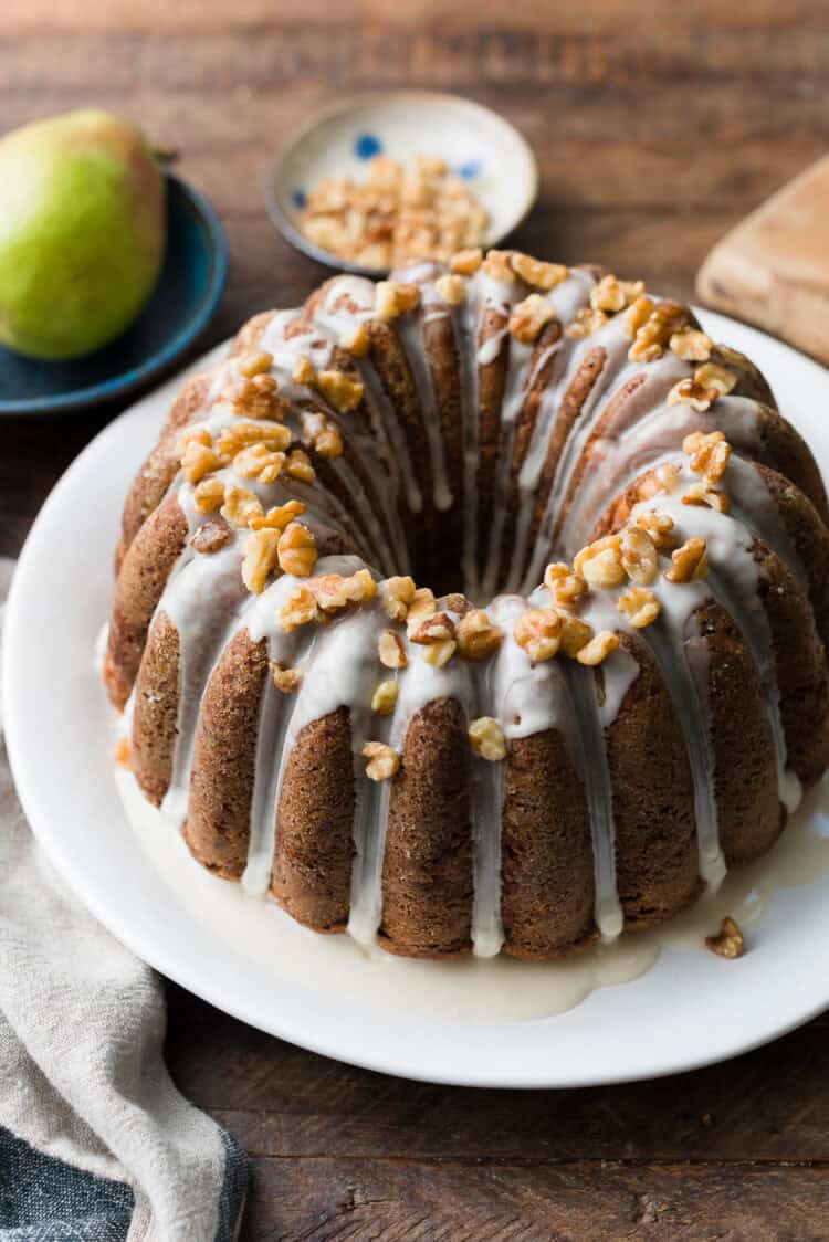 Pear Walnut Bundt Cake on a serving plate.