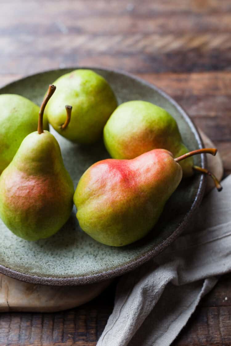 pears in a bowl for pear walnut cake