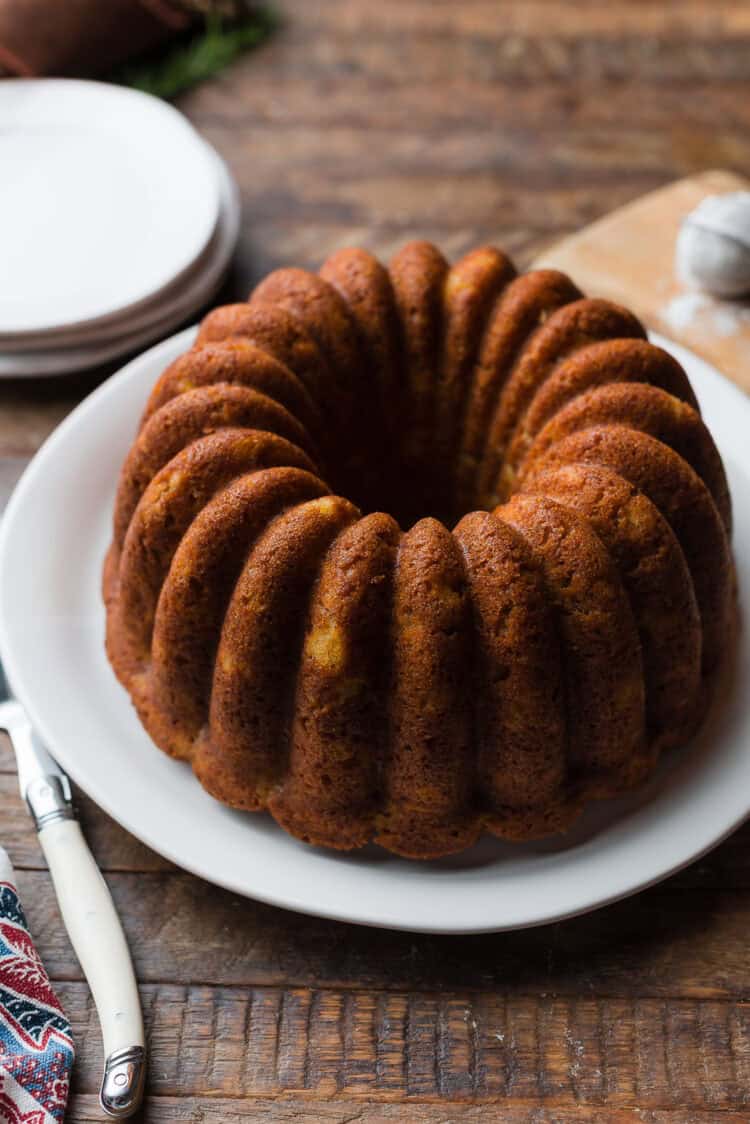 Banana pineapple cake released from Bundt pan on a plate.