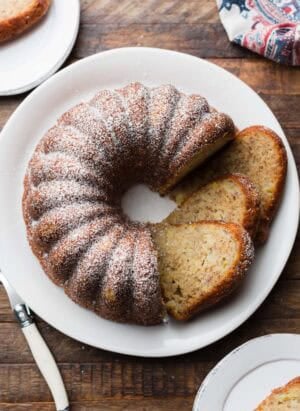 Banana Pineapple Cake sliced on a serving plate.
