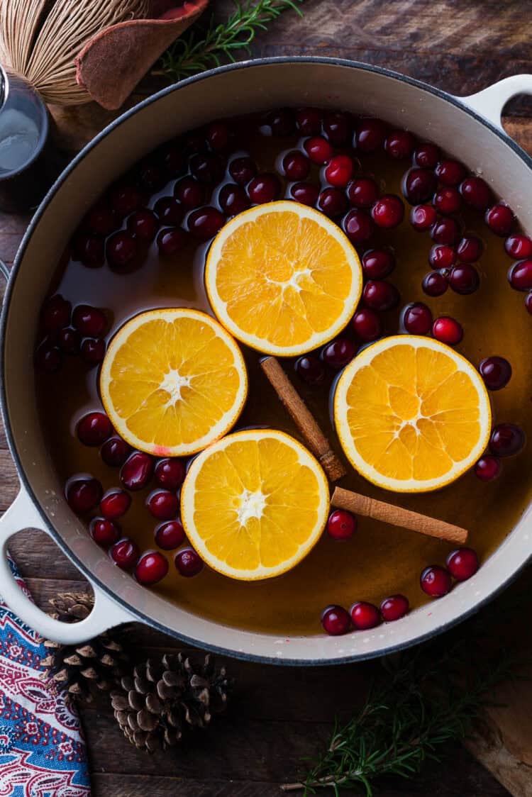 Ingredients for wassail in a dutch oven.