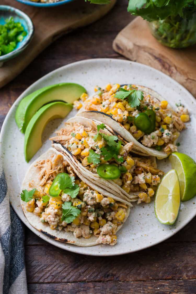 Mexican Street Corn Chicken tacos on a plate.
