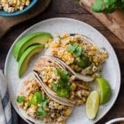 Mexican Street Corn Chicken tacos on a plate.