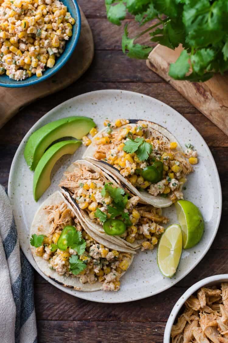 Mexican Street Corn Chicken tacos on a plate.