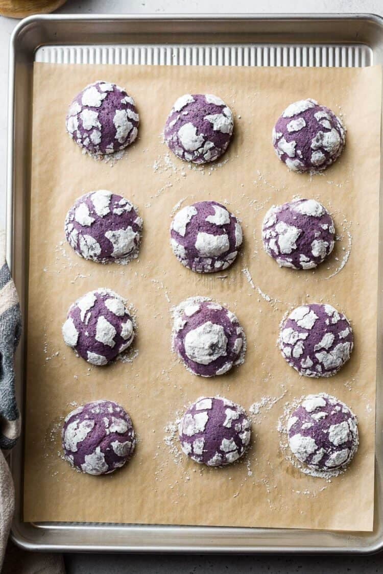 Ube Crinkle Cookies on a baking sheet.