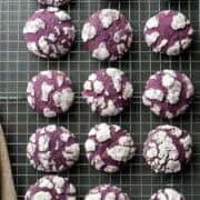 Ube Crinkle Cookes on a wire rack.