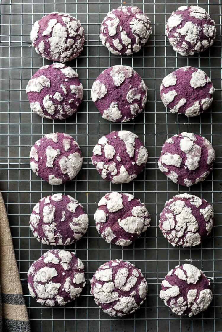 Ube Crinkle Cookes on a wire rack.